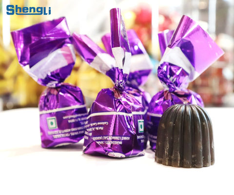 Materiale di imballaggio in PET 260 ppm Macchina per avvolgere il cioccolato a torsione orizzontale a singolo capo