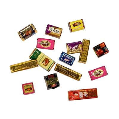Macchina per avvolgere le buste di cioccolato per un avvolgimento liscio e preciso